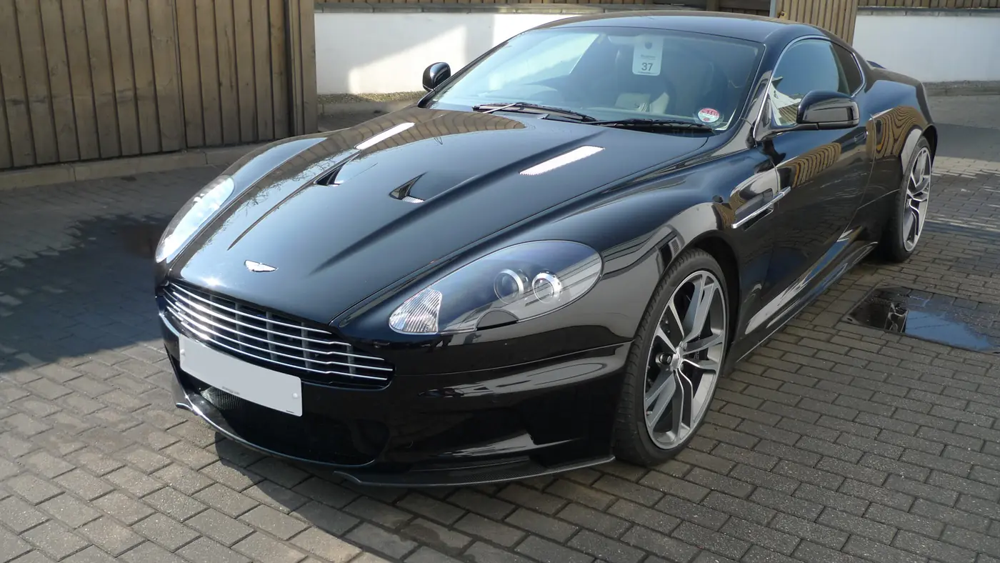 Black Aston Martin outside the studio