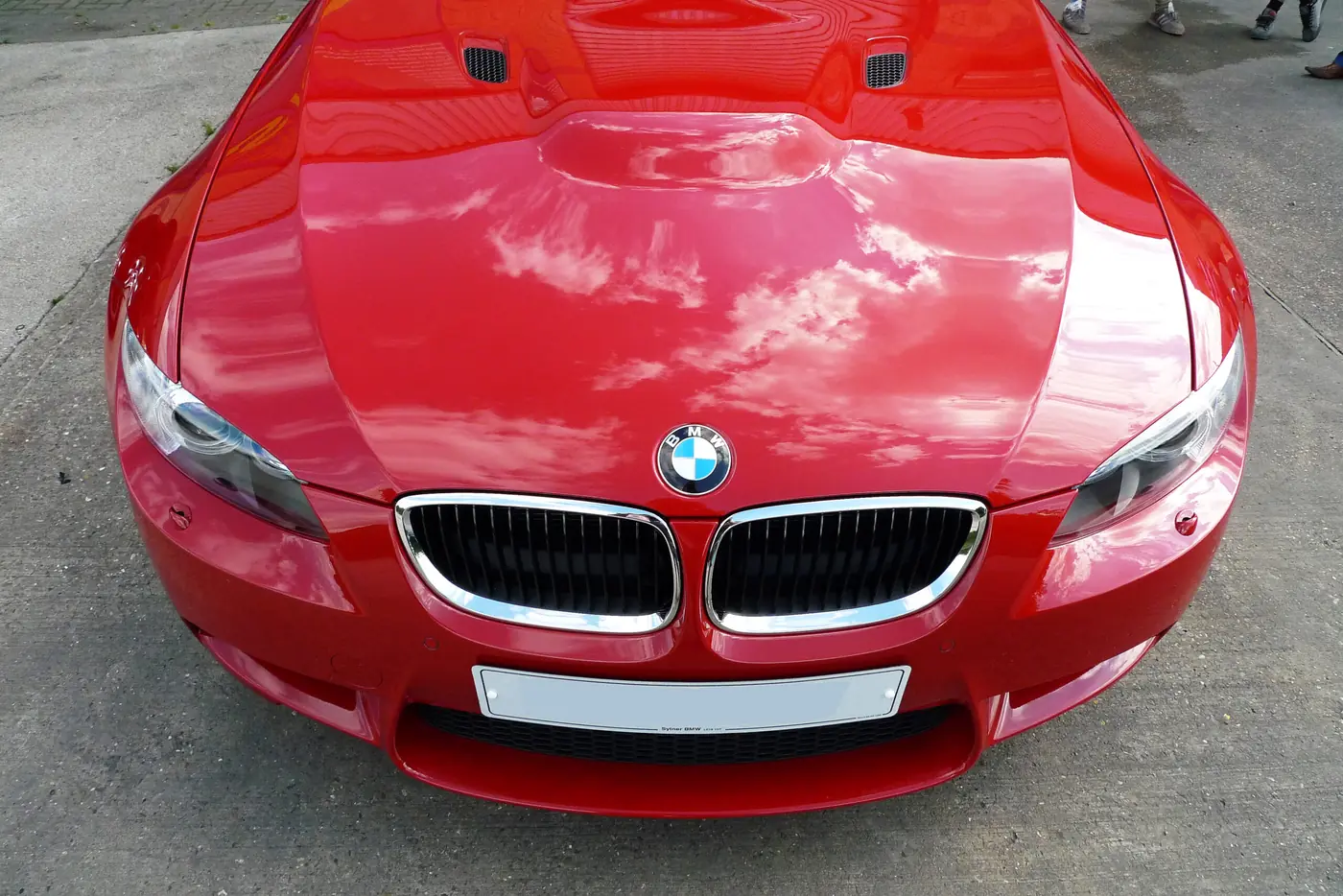 Red BMW M3 front after a detail
