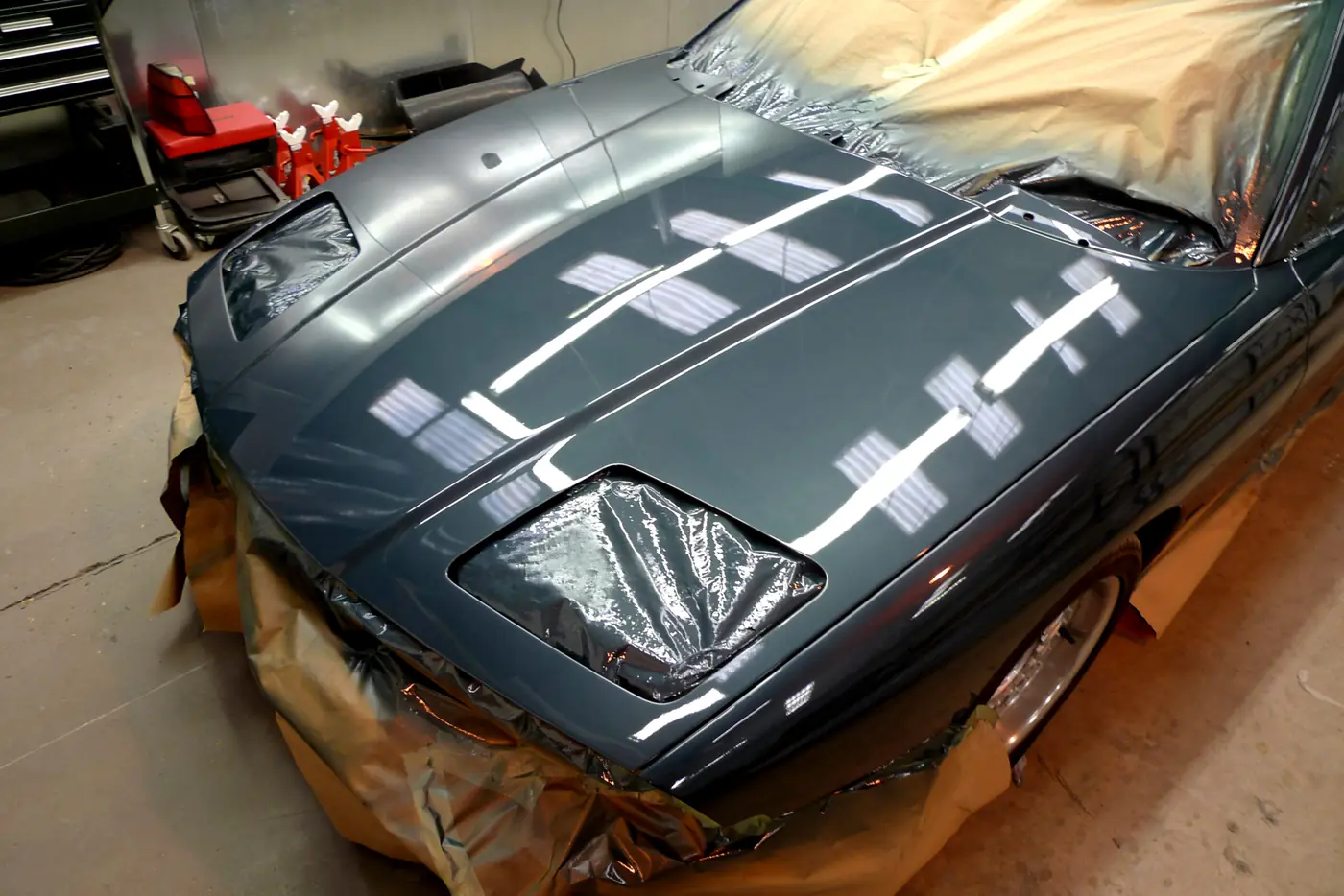 BMW 840Ci stripped and masked for a respray