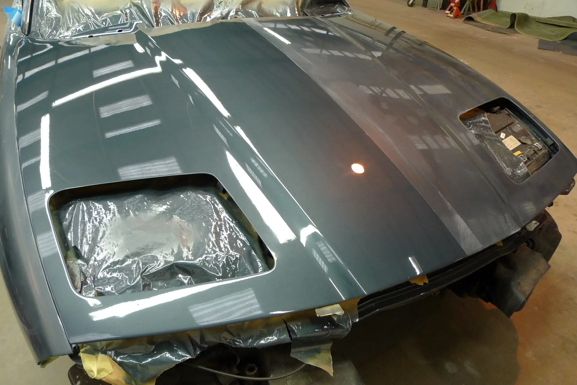 BMW 840Ci bonnet masked up for paint refinishing